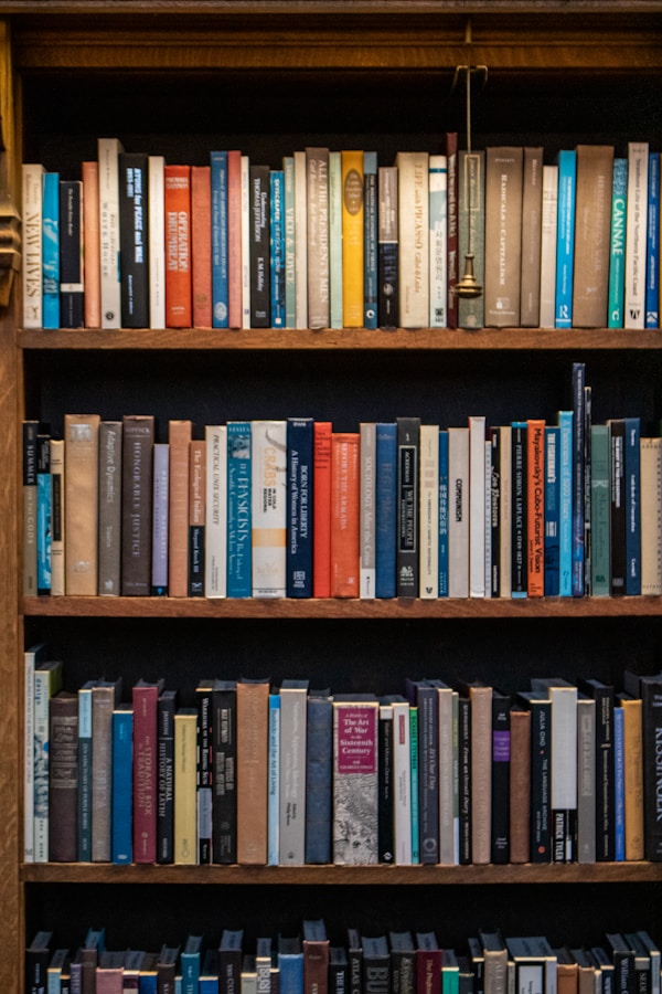 Bookshelves are filled with numerous, colorful books from Contact page Books In Chronological Order